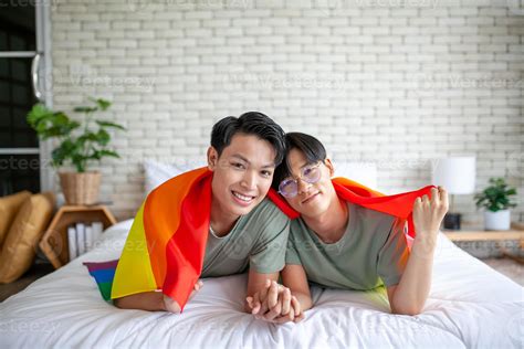 Happy Asian Gay Couple Holding Hands Together Relaxing At Home On Bed Lgbtq Concept 10279899