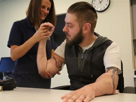 Marine Vet Quadruple Amputee Gets Double Arm Transplant