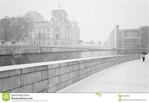Winter In Berlin City With Walking People And The Reichstag Building