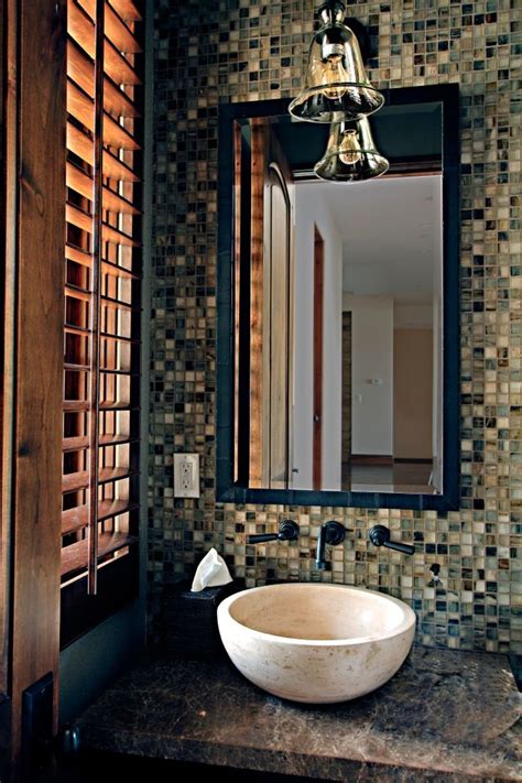 Powder Room With Mosaic Tile Feature Wall And A Natural Stone Vessel