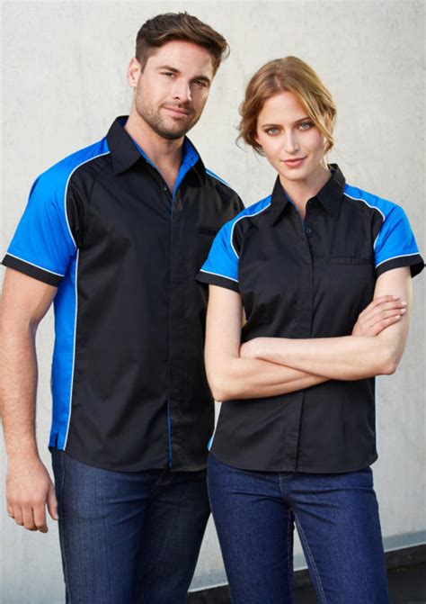 65 polyester 35 cotton twill contrast panels on the shoulder and sides piping detail and side