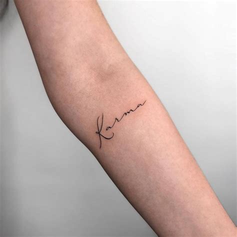 Karma Lettering Tattoo On The Inner Forearm