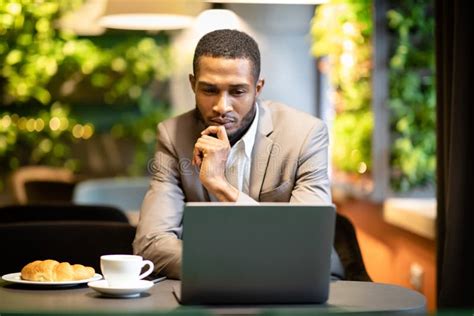 Black Guy Sitting In Coffee Shop Working On Pc Stock Photo Image Of