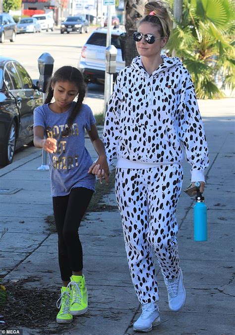 Find the perfect heidi klum kids stock photos and editorial news pictures from getty images. Heidi Klum goes funky chic in dalmatian tracksuit with ...