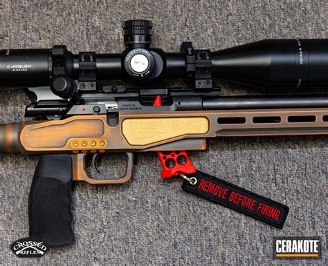 Custom Rifle Coated In Tequila Sunrise Cobalt And Gold Cerakote