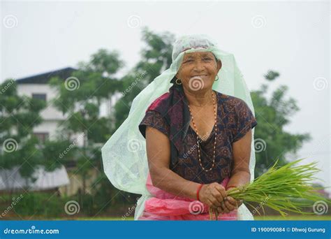 Chitwan Nepal Jun 10 2020 Nepali Woman Posing For A Camera While Working During Monsoon From
