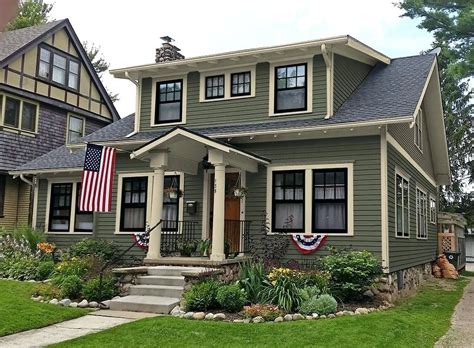 With a gray or black roof, you may want variants of gray, blue, green or purple. sage green exterior paint exterior paint colors consulting ...