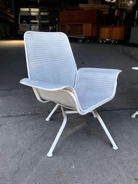 Modernize the inside and the outside of your home with emfurn. Pair of Mid-Century Modern Wicker and Metal Outdoor Lounge Chairs, Woodard For Sale at 1stdibs