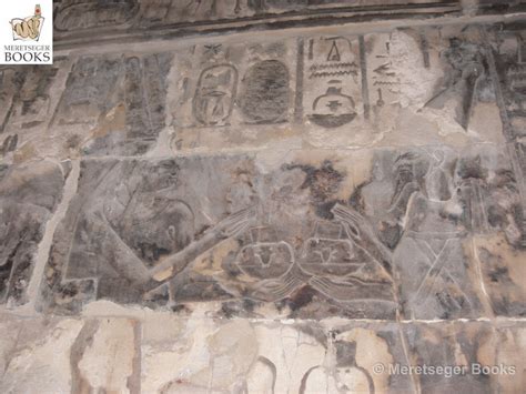 An Image Of Ancient Egyptian Art On The Wall With Writing And Symbols Painted On It