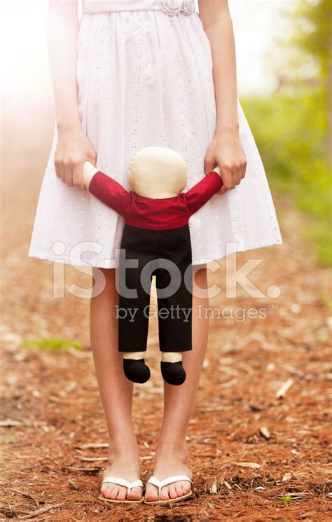 Young Girl Holding Doll Stock Photo Royalty Free Freeimages