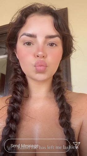 Demi Rose Wears Only Pigtails As Gorgeous Island Girl