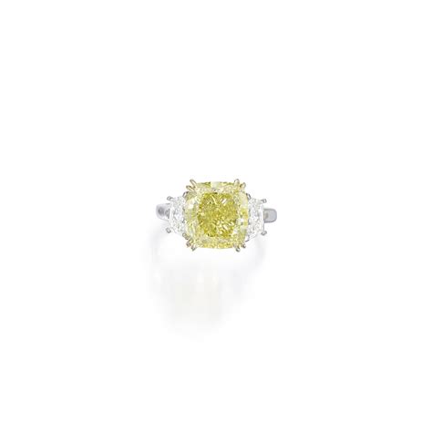 35 Platinum Gold Fancy Intense Yellow Diamond And Diamond Ring