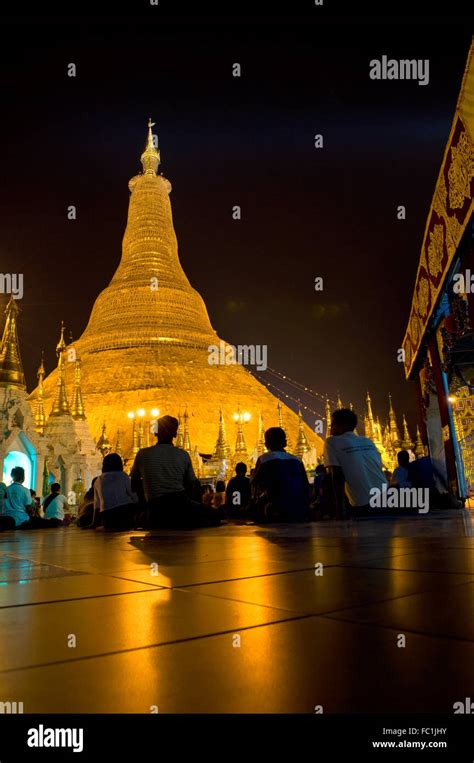 People At Prayer At The Stunning Stupa Of Shwedagon Pagoda Yangon