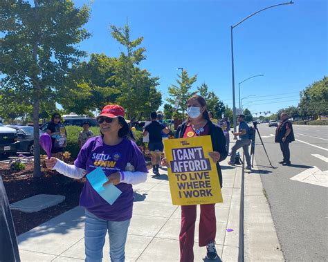Kaiser Permanente union workers picket at health care facilities across