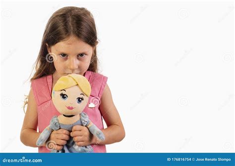 Girl Holding A Doll On A White Background Stock Photo Image Of