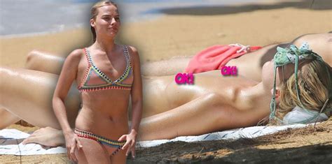 Margot Robbie Goes Totally Topless For Nude Sunbathing On Vacation
