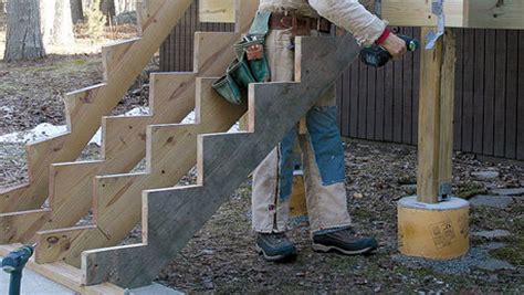 Handrails required on stairways must meet specific guidelines: Mounting Deck Stairs - Fine Homebuilding