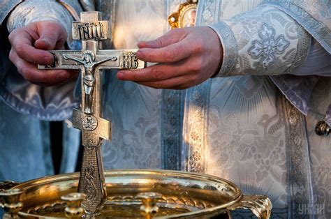 Orthodox Christians mark Epiphany with freezing plunges - media | UNIAN