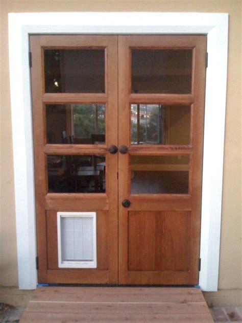 The door is a french door like this one, the door on the right opens, the door on the left is fixed in place: TOP 20 custom and classic French doors with dog door ...