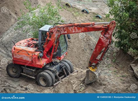 Red Excavator Digging A Pit Editorial Image Image Of Development