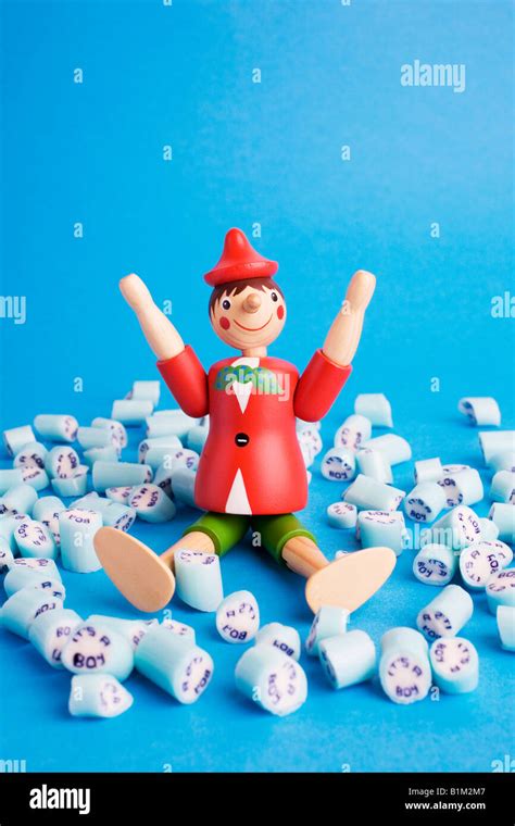 Pinocchio The Wooden Boy Toy With Its A Boy Rock Sweets Stock Photo