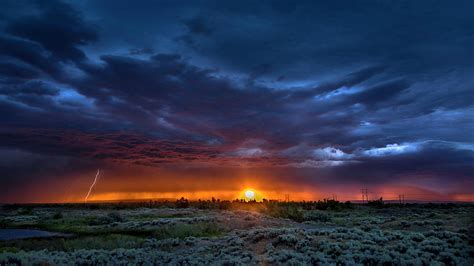 Lightning Strike At Sunset Photograph By Bob Juarez Fine Art America
