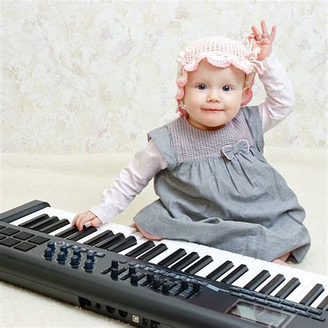 Baby Playing Piano Stock Photos Pictures And Royalty Free Images Istock