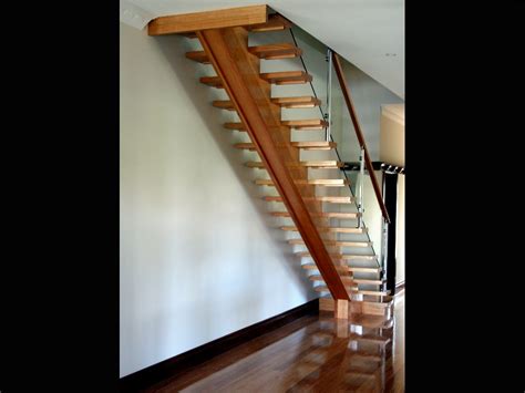 Centre Carriage Staircase With Glass Balustrade