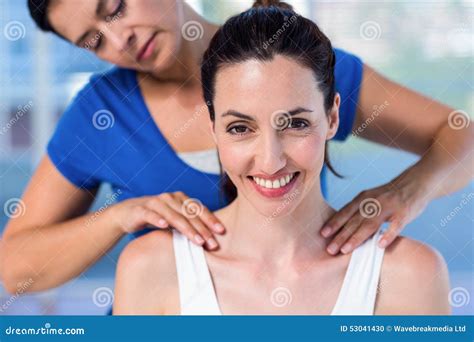 Therapist Doing Back Massage To Her Patient Stock Photo Image Of