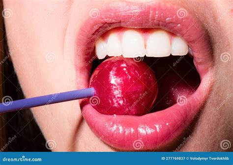 glamor mouth licking yummy lollypop with red lips sucks lolli pop female lip stock image