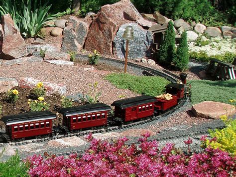 outdoor model train layout landscaped with succulent plants garden railroad garden trains
