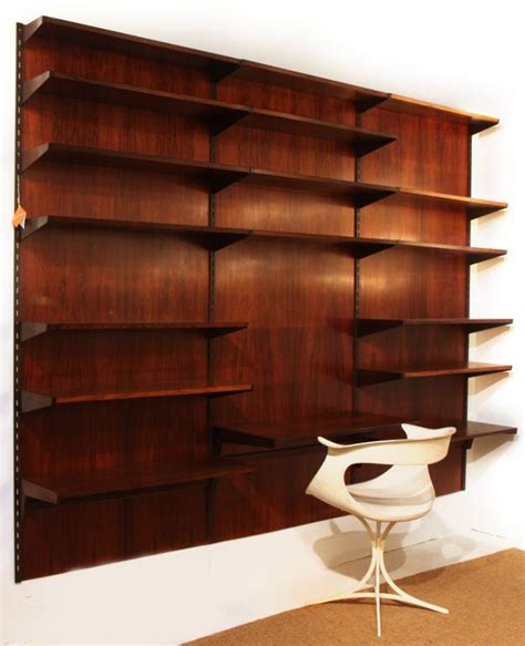 High + low modular shelving systems. Rosewood Adjustable Shelving Wall System by Kai ...