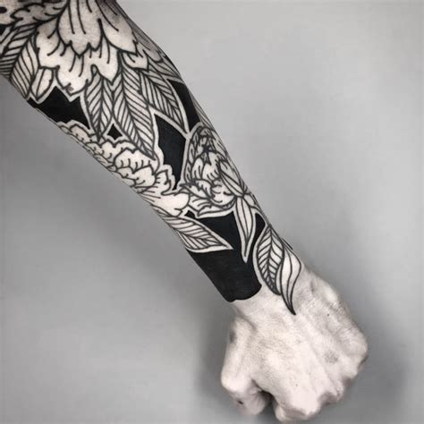 black and white forearm tattoos