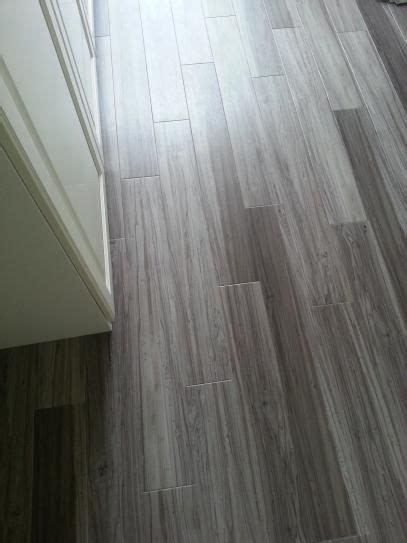 Underlayment for luxury vinyl tile and plank flooring with sound reduction made from 100% virgin latex rubber, soundbuffer made from 100% virgin latex rubber, soundbuffer is cri (carpet and rug institute) certified and residential and commercial rated for under a variety of overlying flooring products. TrafficMASTER Allure Plus 5 in. x 36 in. Grey Maple Luxury ...