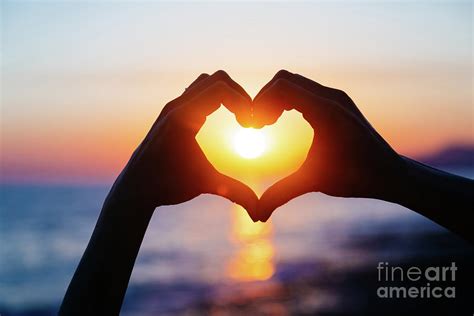 Hands Forming A Heart Shape With Sunset By Teraphim