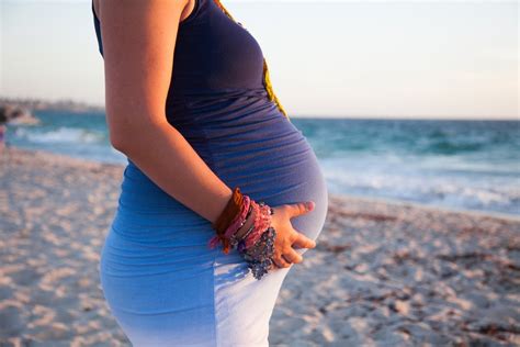Pregnant Belly At The Beach Beach Maternity Photo Beach Maternity