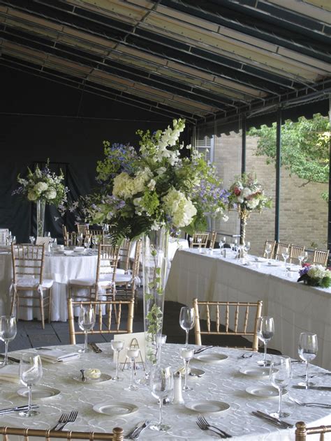 On The Porch At Glenmanor Purple Green White Centerpieces For A June