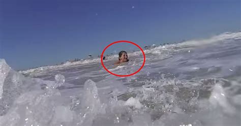 Dramatic Footage Shows Drowning Woman Being Rescued Just Moments Before She S Swept Out To Sea