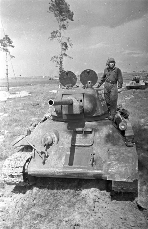 World War Ii In Pictures — Soviet Tank Driver On His T 34