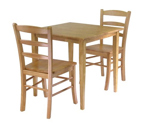 The compact dimensions of the table make it easy to fit it into small spaces, and since the chairs tuck mostly under the table, they won't get in the way. Small Kitchen Table Sets