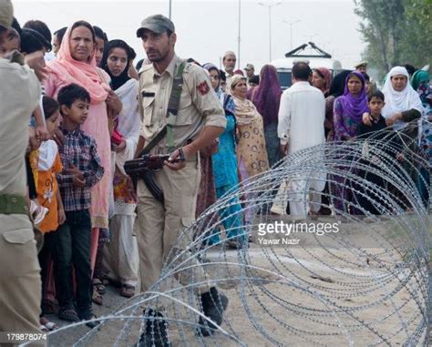 Relatives And Neighbors Look Towards Kashmiri Hajj Pilgrims Departing News Photo Getty Images
