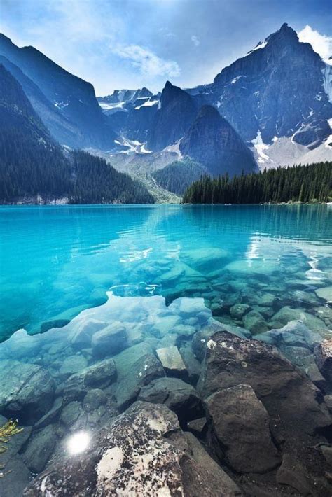 The Teal Blue Water Of Moraine Lake In Banff National Park Alberta