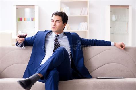 The Businessman Drinking Wine Sitting At Home Stock Image Image Of