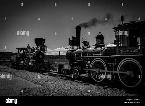 Grayscale Shot Of An Old Train On The Railroad In The Golden Spike
