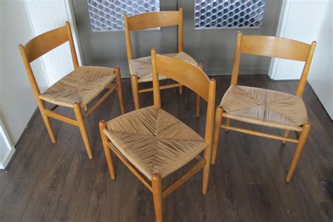 The woven seat sets this chair apart from most others. Set of 4 CH36 dining chairs in wood and woven rope, Hans ...