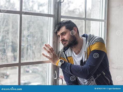 Sad Bearded Man Looking Through The Window Stock Image Image Of