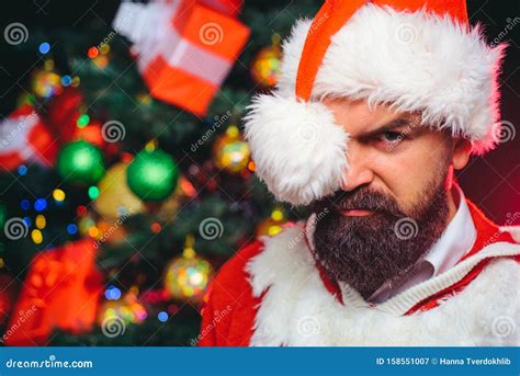 Handsome Bearded Santa Christmas Man With Long Beard In Red Santa
