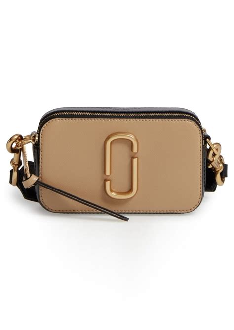 The most common marc jacobs bags material is polyester. Marc Jacobs MARC JACOBS Snapshot Leather Crossbody Bag ...