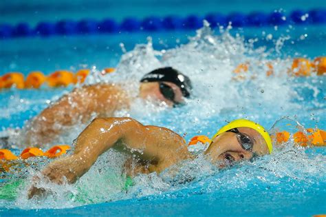 Katie Ledecky Anchors Women Michael Phelps Returns To Podium As Us