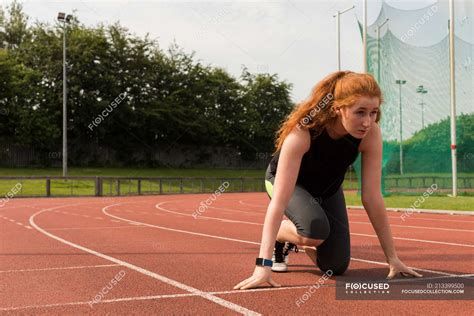 Young Fit Latin Female Athlete Running Stock Photo Image